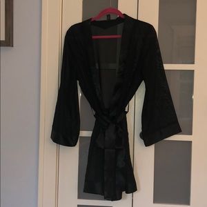Sheer black robe.